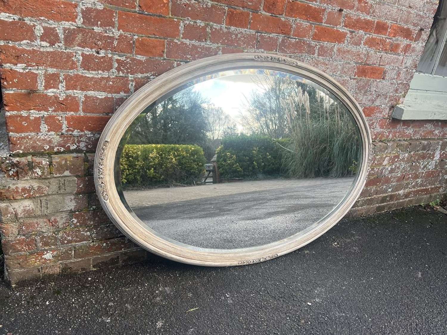 An Exceptional large Antique French 19th C carved  painted Oval Mirror