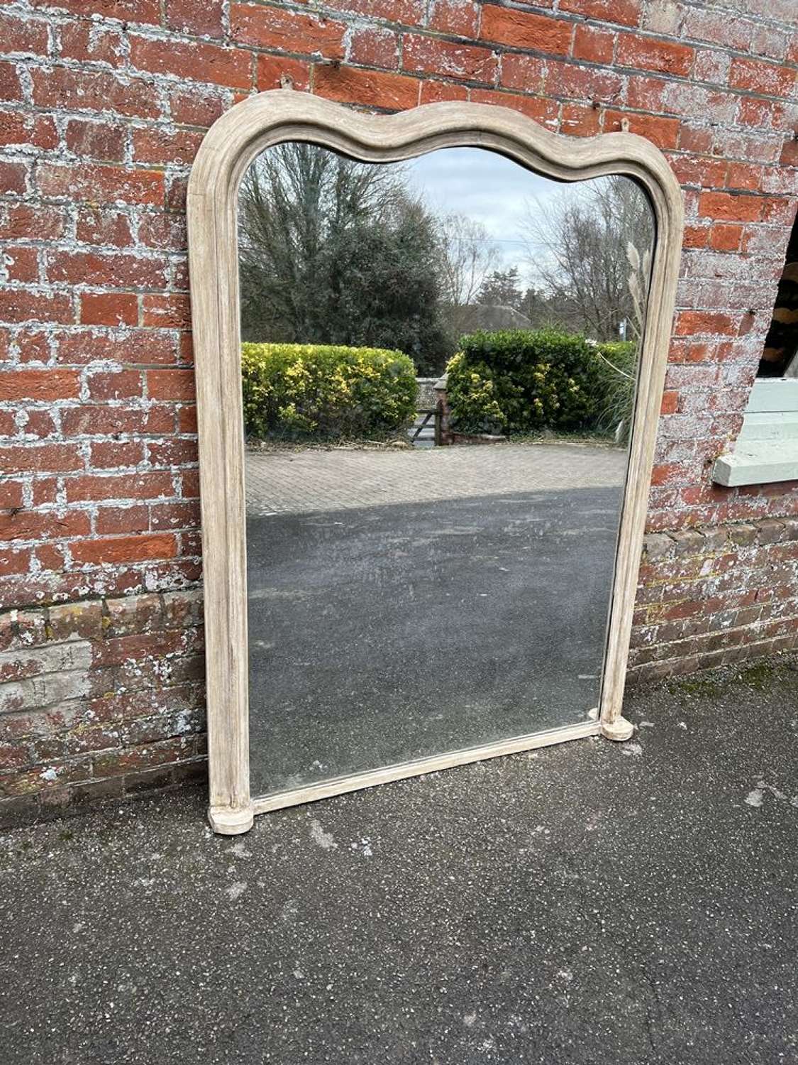 An Exceptional large Antique English 19th Century shaped top Mirror.