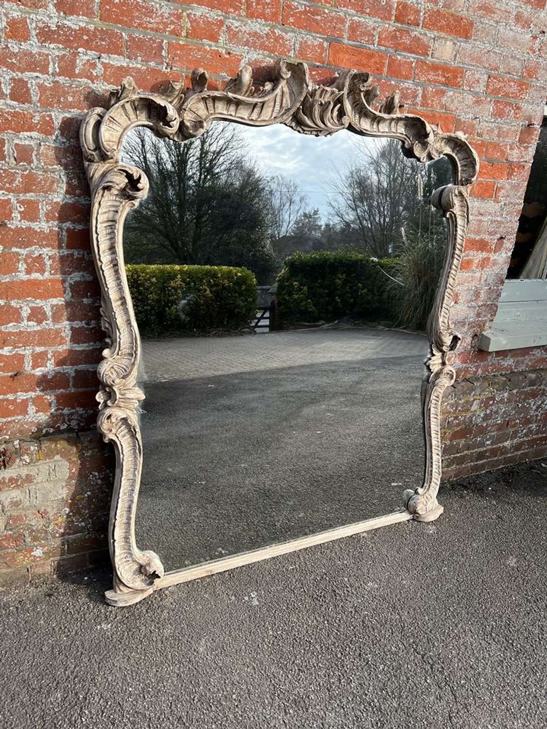 A Spectacular large Antique English 19th C shaped top painted Mirror.