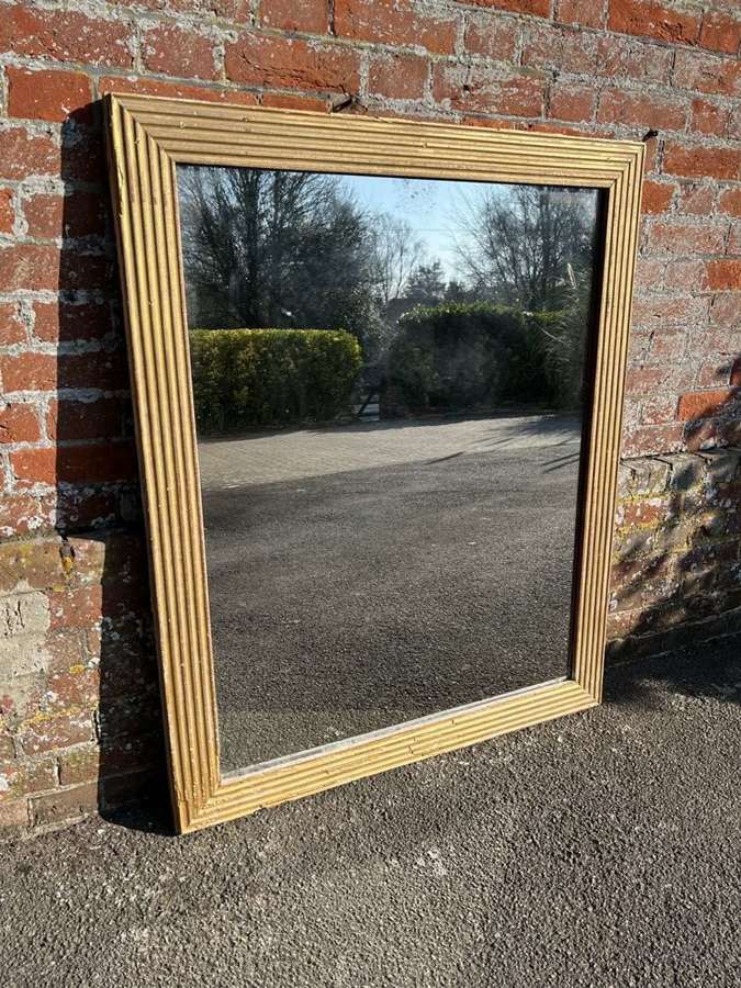 A Stunning Large Antique French 19th C gilt ribbed Mirror.