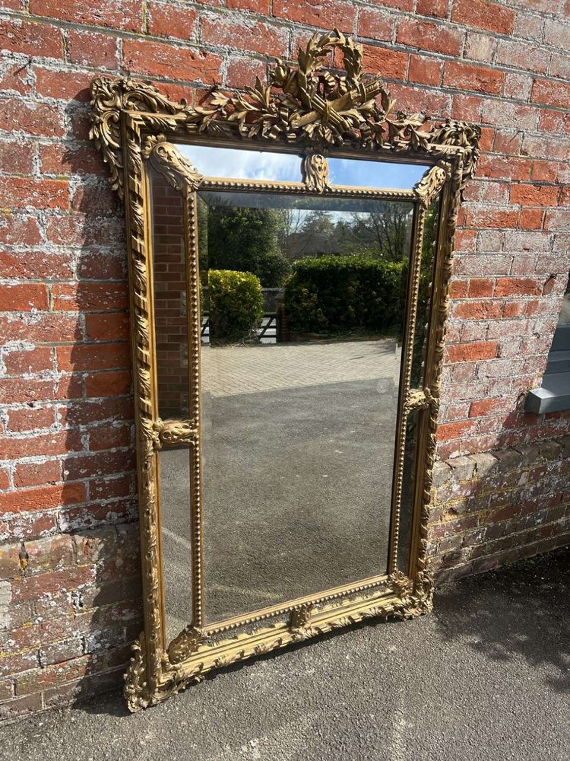 A Spectacular large Antique French 19th Century gilt Cushion Mirror.