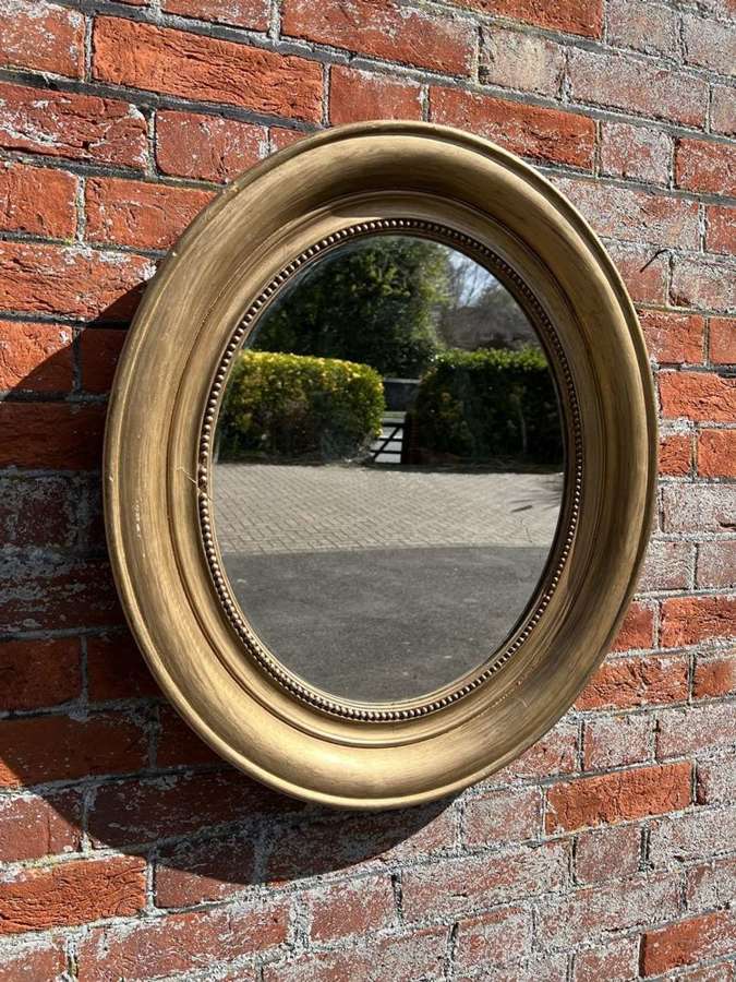 A Fabulous Antique French 19th C carved wood & gesso gilt Oval Mirror.