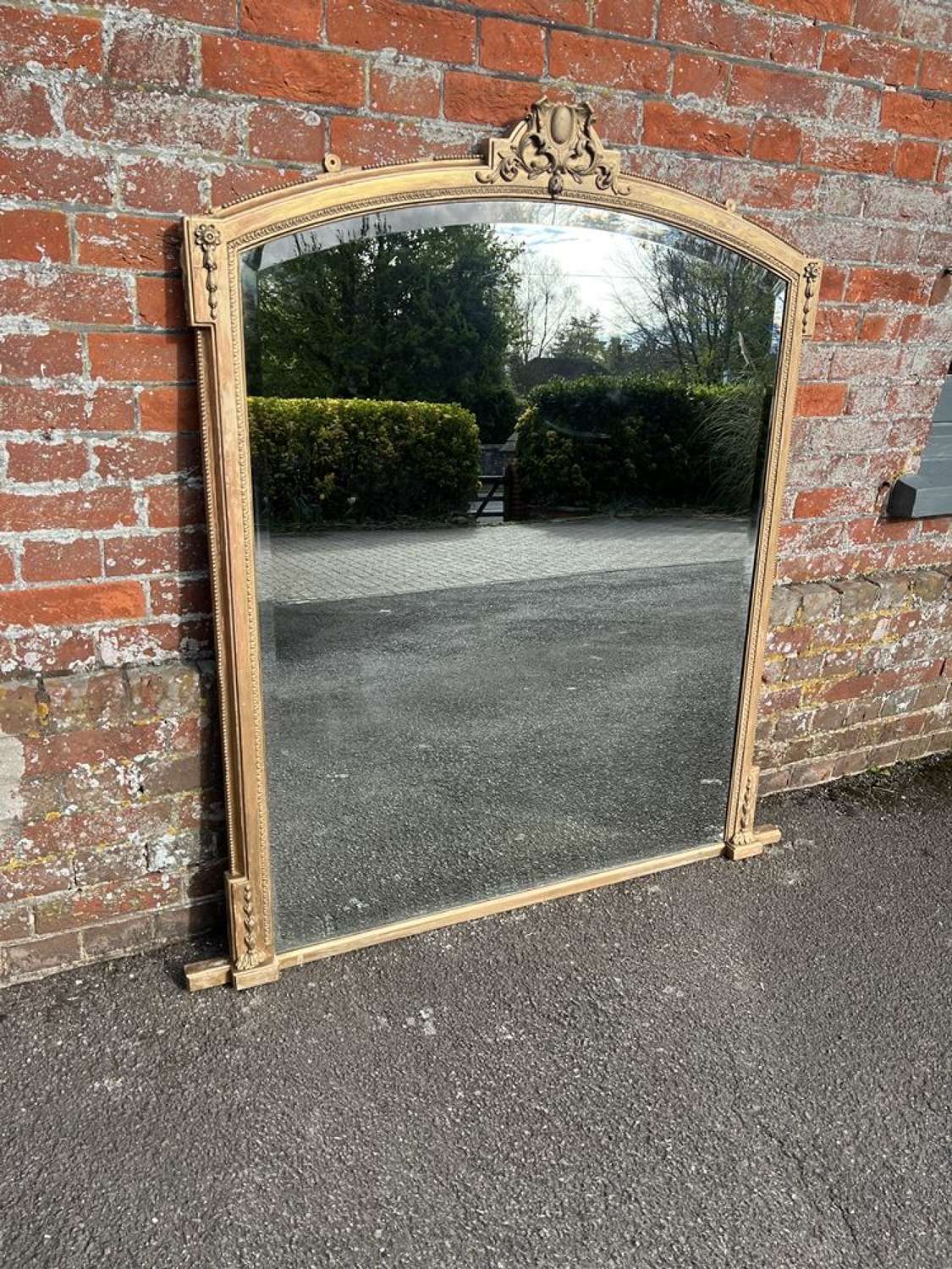A Stunning  Antique English 19th C  shaped top gilt Overmantle Mirror