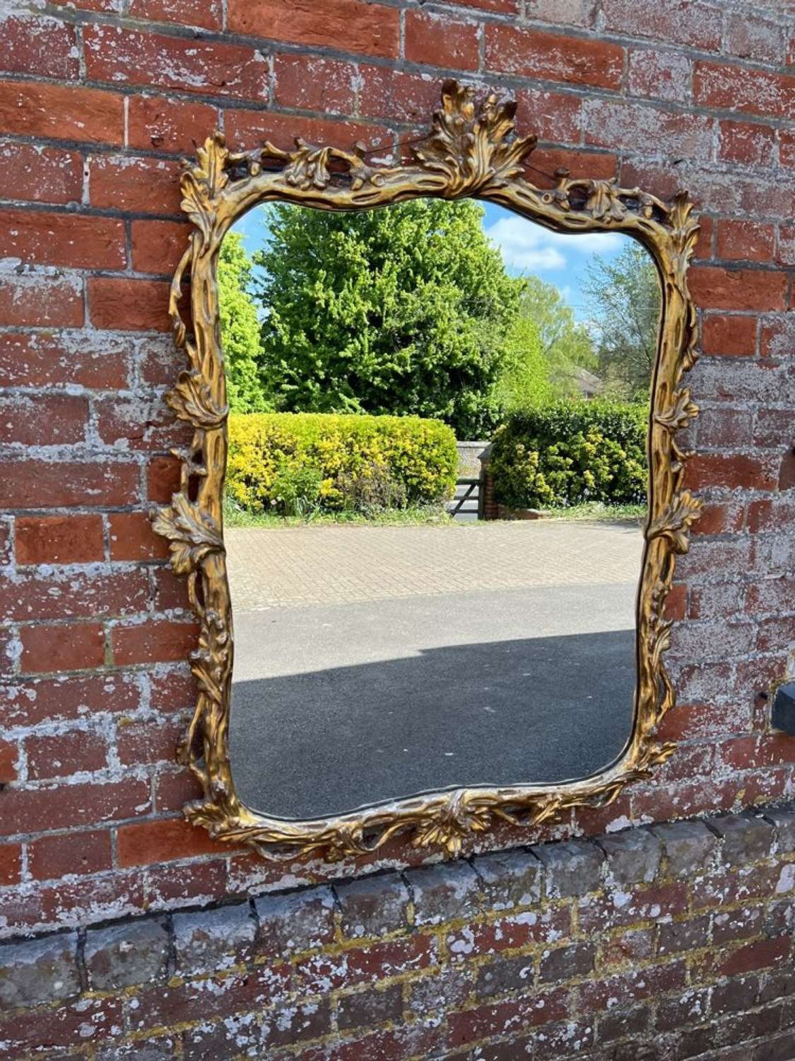 A Delightful Antique French early 20th C carved wood gilt Mirror