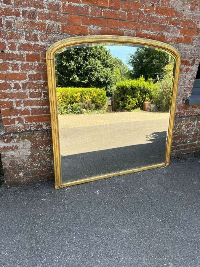 A Stunning large Antique English 19th C gilt Overmantle Mirror.