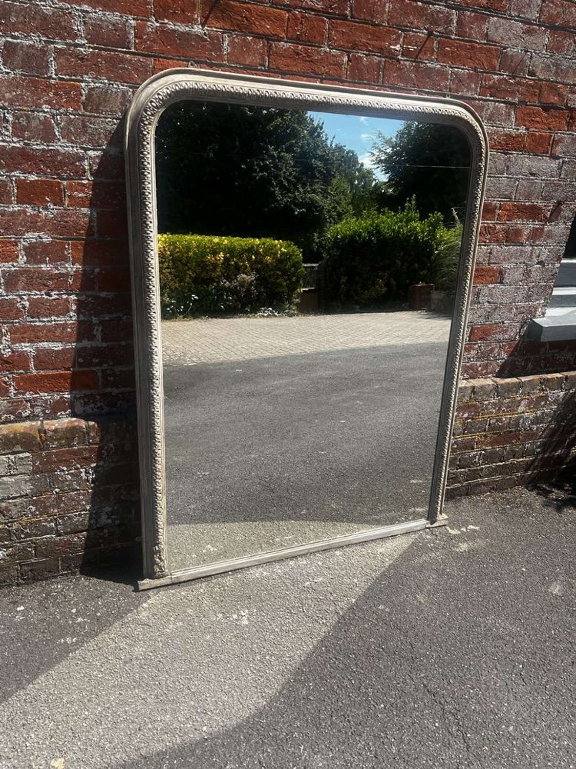 A Fabulous large Antique English 19th C Arched top Overmantle Mirror.