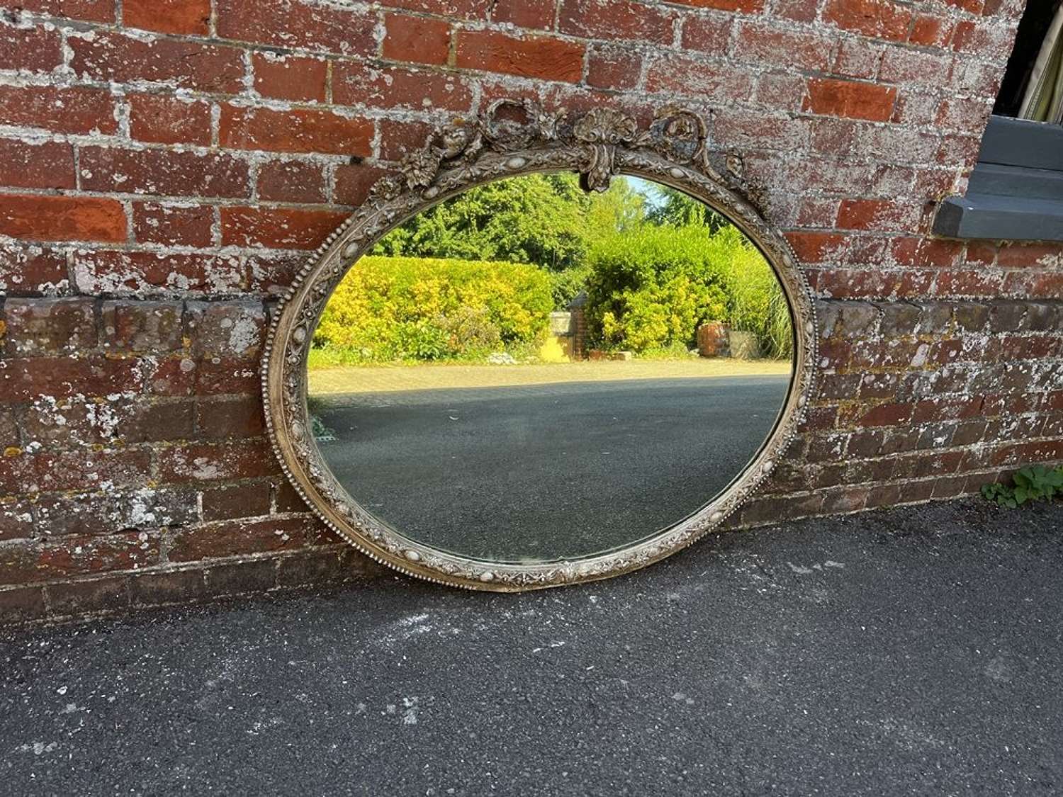 A Fabulous Antique French 19th C painted Oval Mirror.