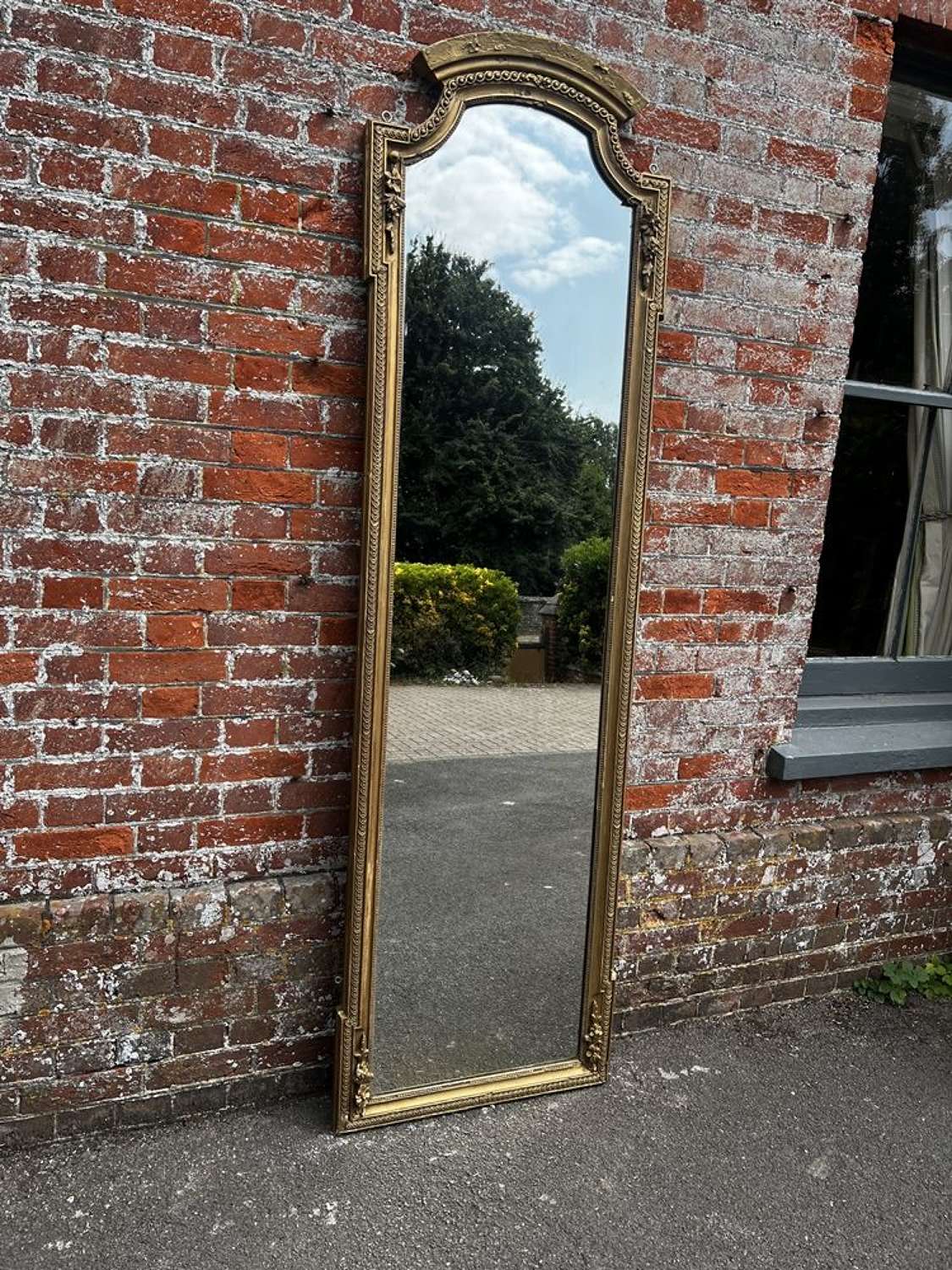 A Superb large Antique French 19th Century shaped top gilt Mirror.