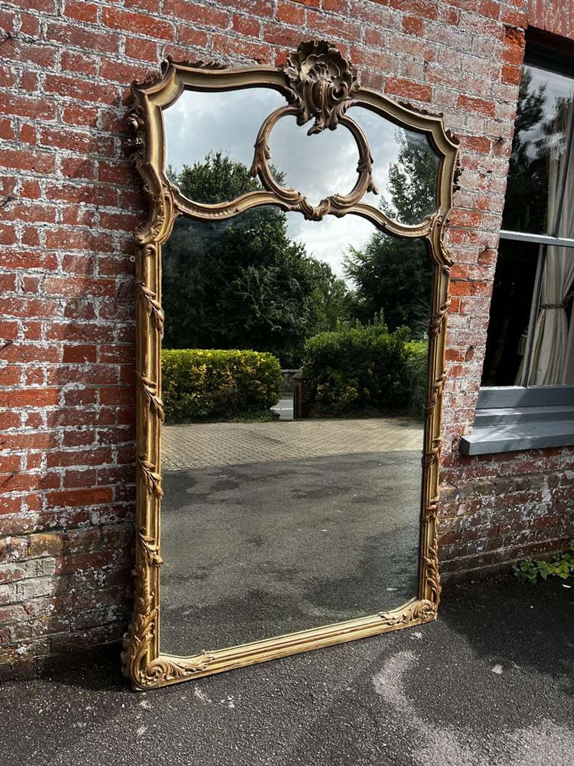 A Spectacular large Antique French 19th C gilt & painted shaped Mirror