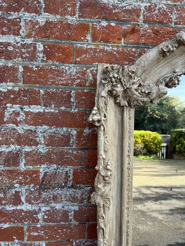 An Impressive large Antique French 19th C Shaped top painted Mirror.