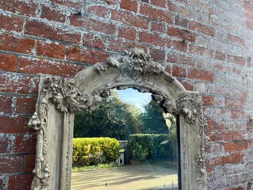 An Impressive large Antique French 19th C Shaped top painted Mirror.