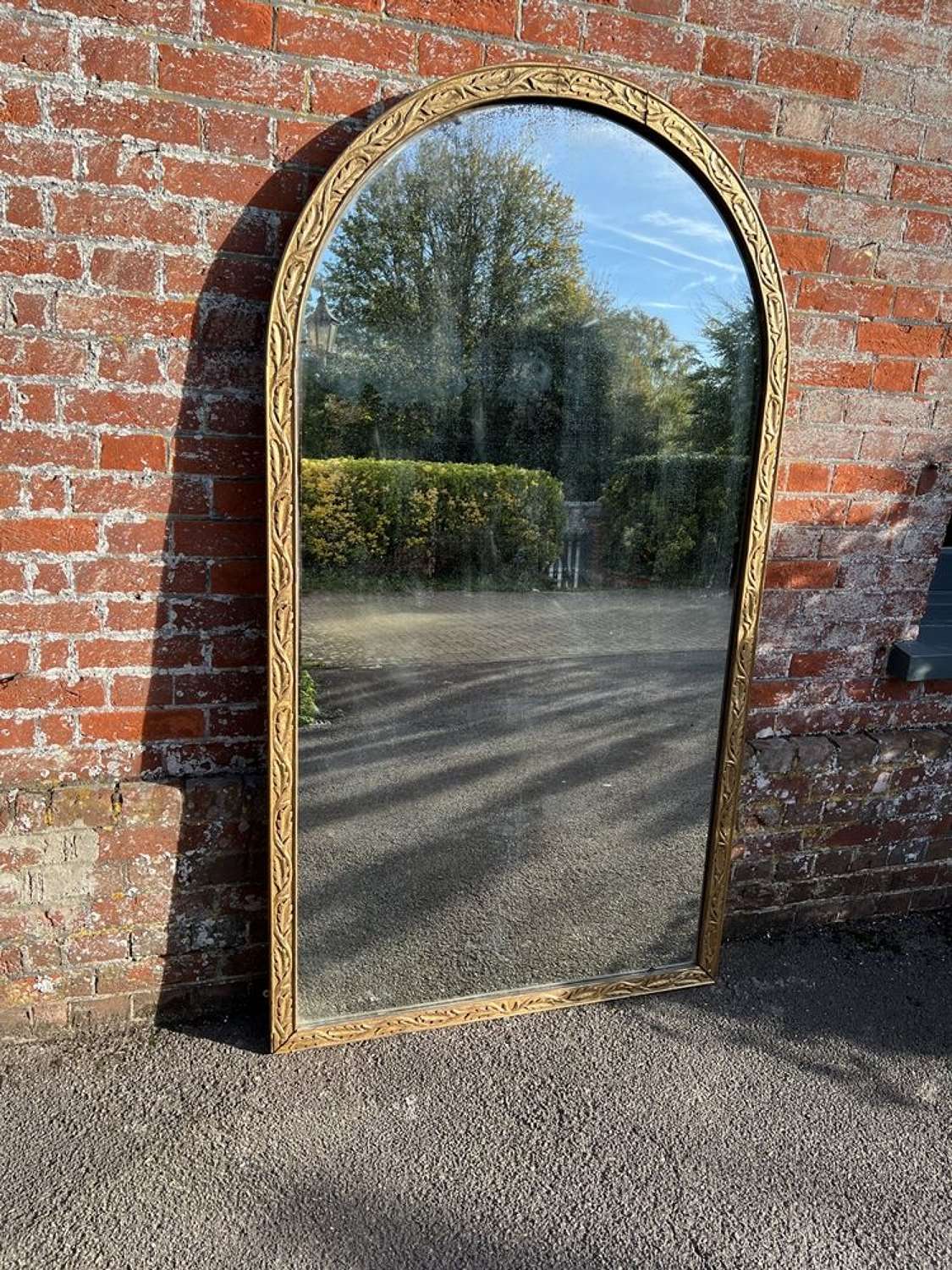 A Stunning large Antique French 19th Century gilt arched top Mirror.