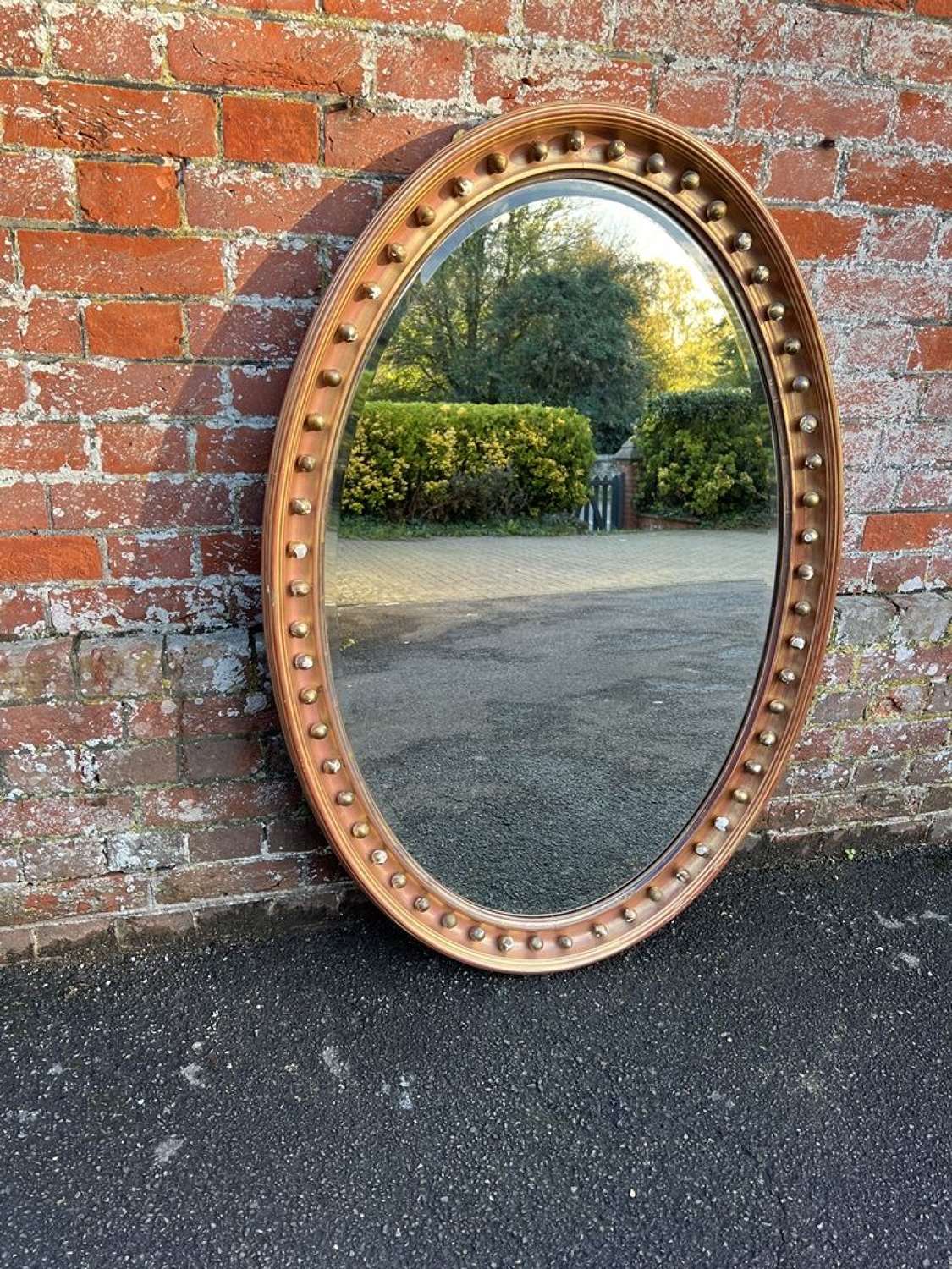 A Wonderful large Antique English 19th C gilt Oval Mirror.