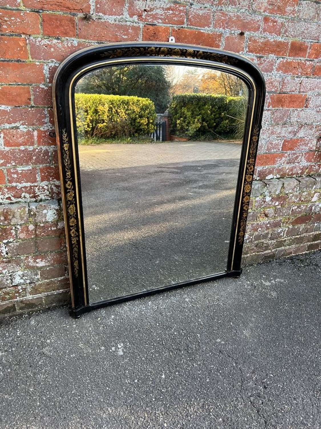 An Exceptional  Antique English 19th C Black & Gilt arched top Mirror.