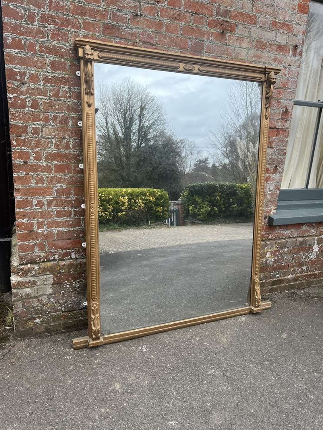 A Spectacular large Antique English 19th C gilt Mirror.