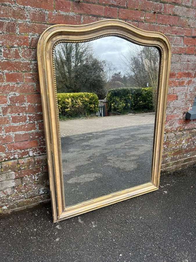 A Wonderful large Antique French 19th C shaped top gilt Mirror.