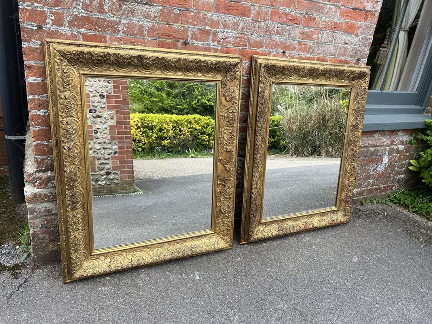 AN Exceptional Pair of Antique English 19th C gilt Mirrors.