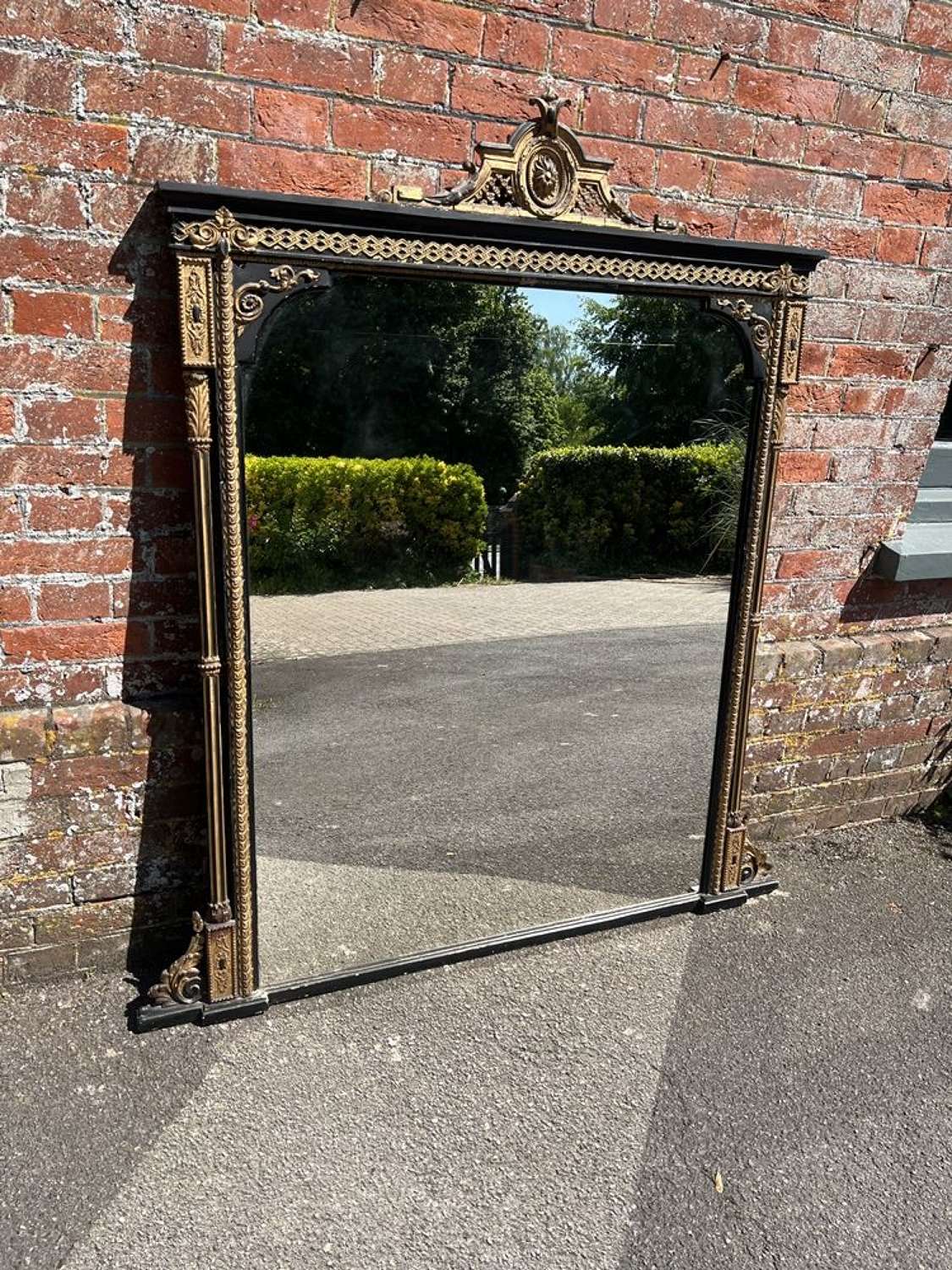 A Wonderful large Antique English 19th C Black & gilt Mirror.