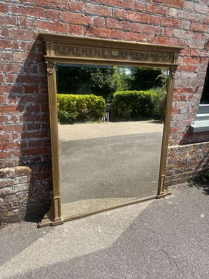 A Fabulous large Antique English 19th C gilt Overmantle Mirror.