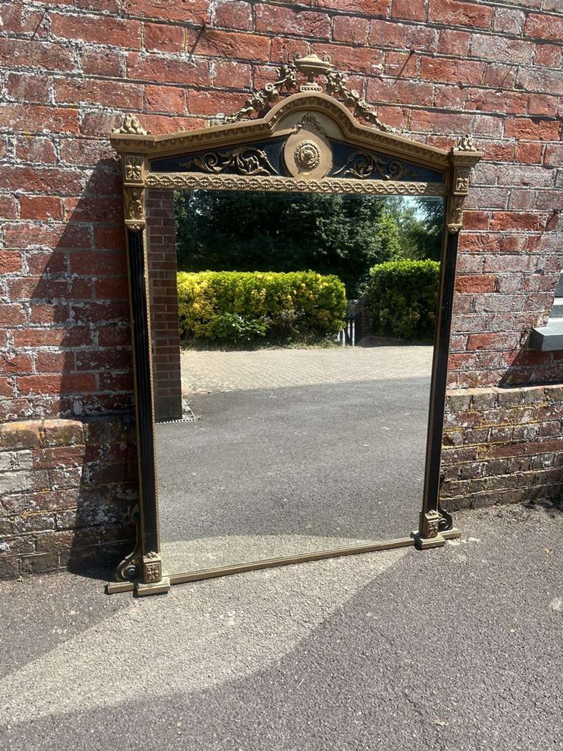 A Stunning large Antique English 19th C gilt & black ribbed Mirror.