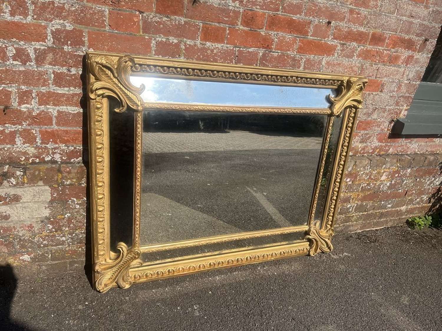 A Stunning large Antique French 19th C Gilt Cushion Mirror.