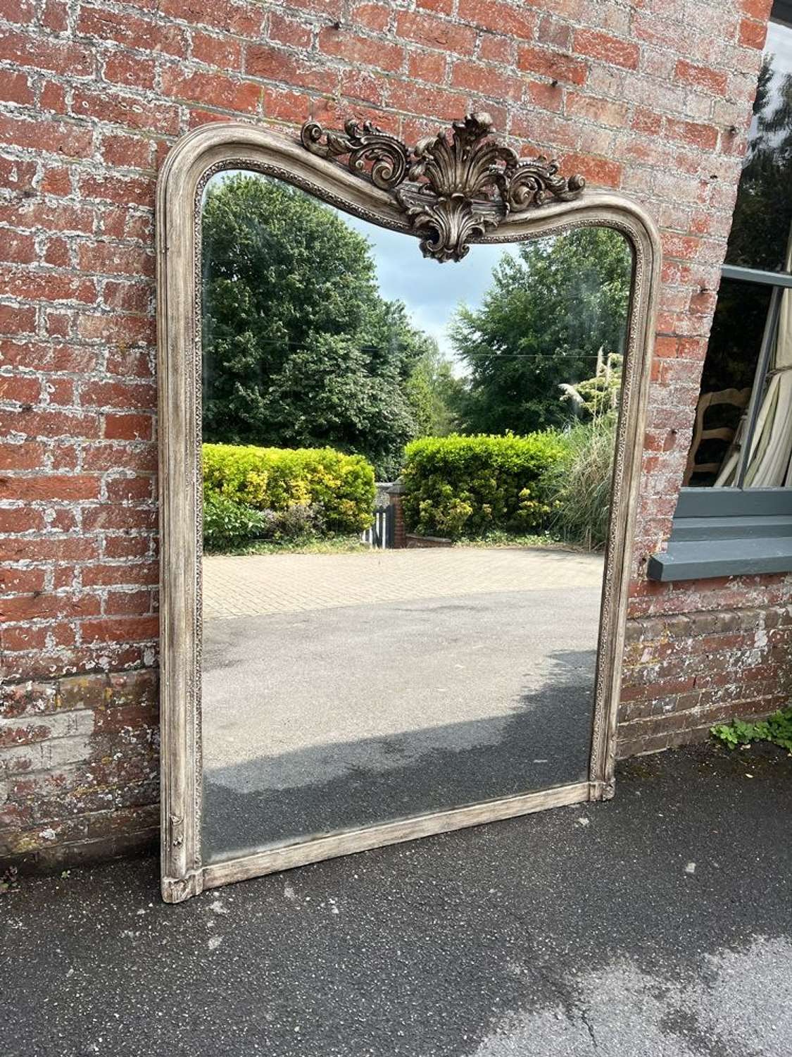 An Exceptional large Antique French 19th C shaped top painted Mirror.
