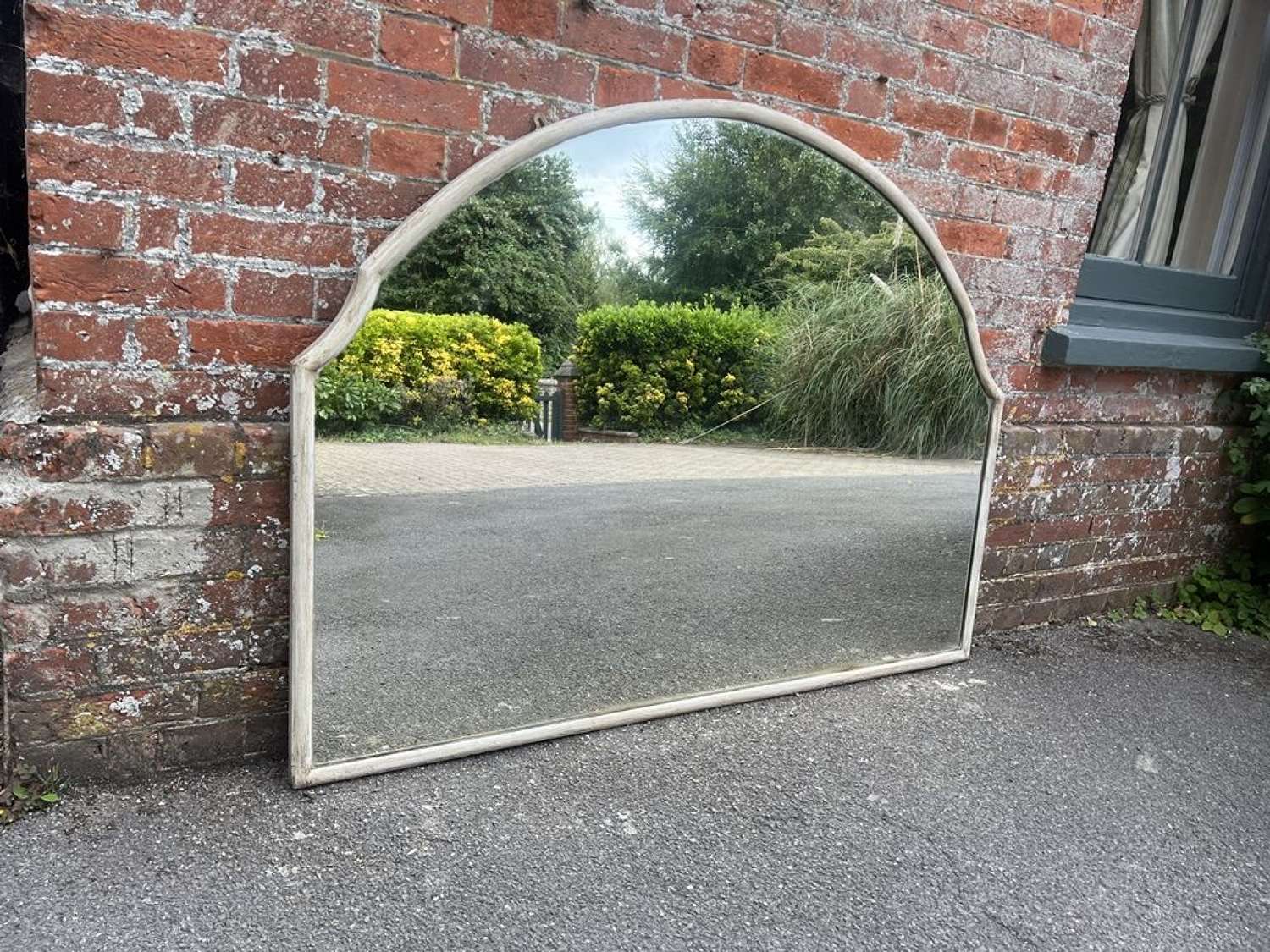 A Wonderful large Antique French 19th C painted shaped Mirror.
