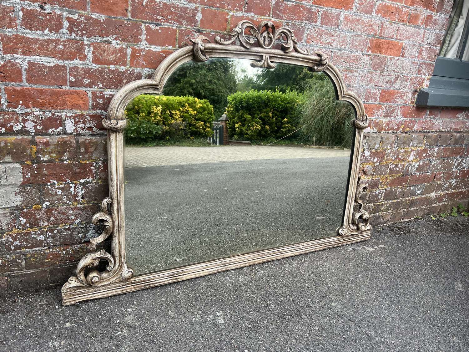 A Fabulous large Antique English 19th C painted shaped top Mirror.