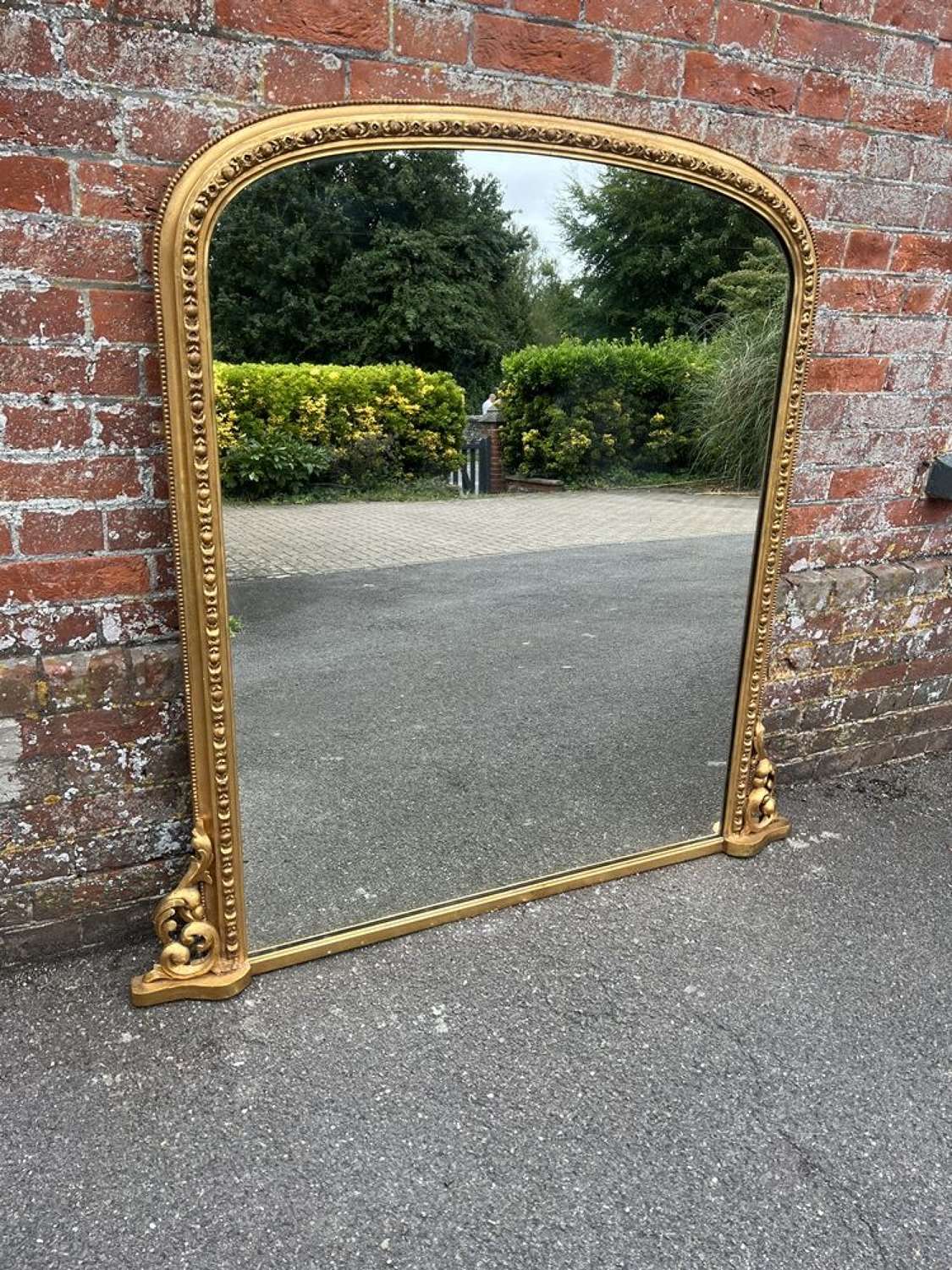 A Stunning large Antique English 19th C gilt Overmantle Mirror.