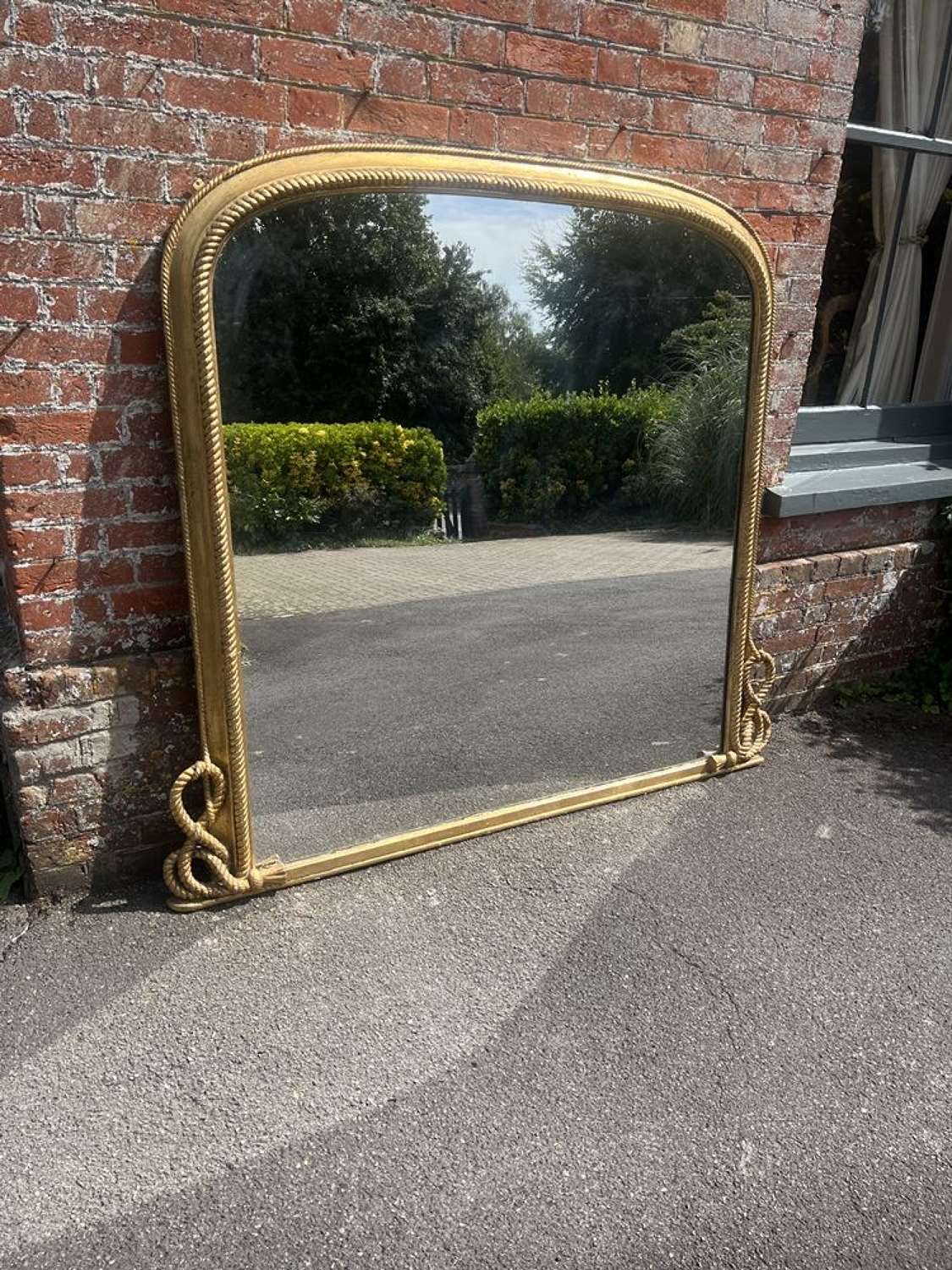 A Spectacular large Antique English 19th C gilt Overmantle Mirror.
