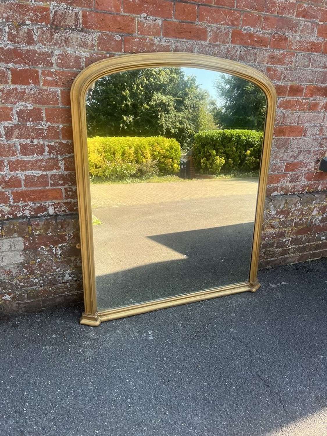 A Fabulous large Antique English 19th C arched gilt Overmantle Mirror.