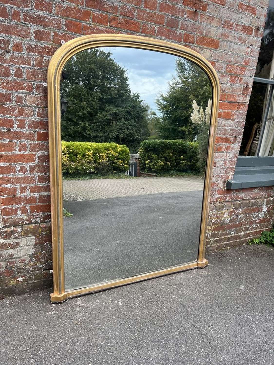 An Exceptional large Antique English 19th C arched top Plain Mirror.