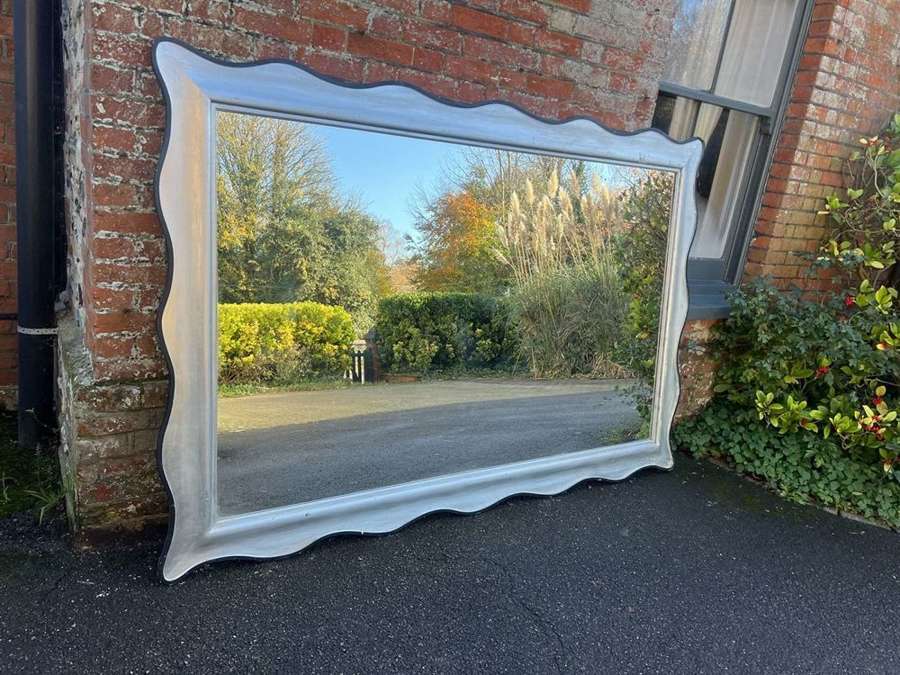 A Superb Extra large late 20th C Silvered shaped framed Mirror.