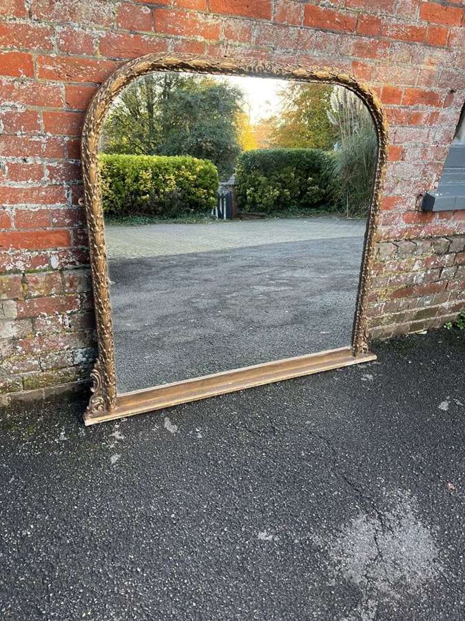 A Fabulous large Antique English 19th C arched gilt Overmantle Mirror.