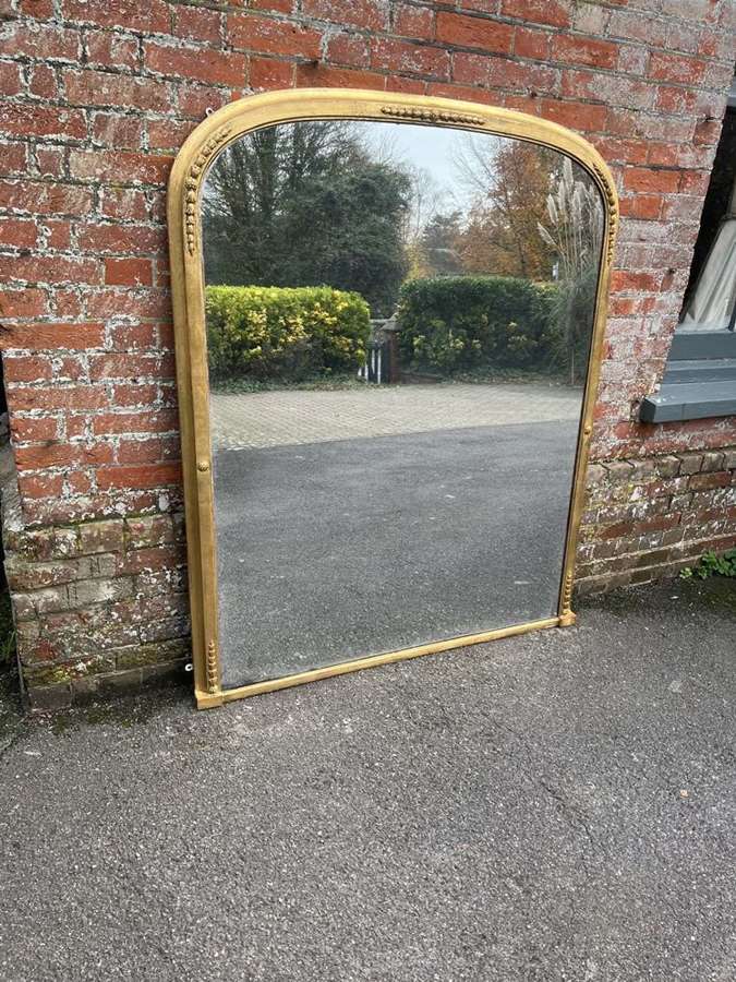 A Wonderful large Antique English 19th C arched top Overmantle Mirror.