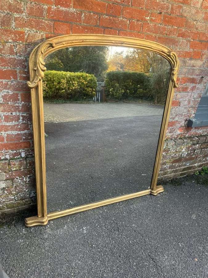 A Stunning large Antique English 19th C arched gilt Overmantle Mirror.