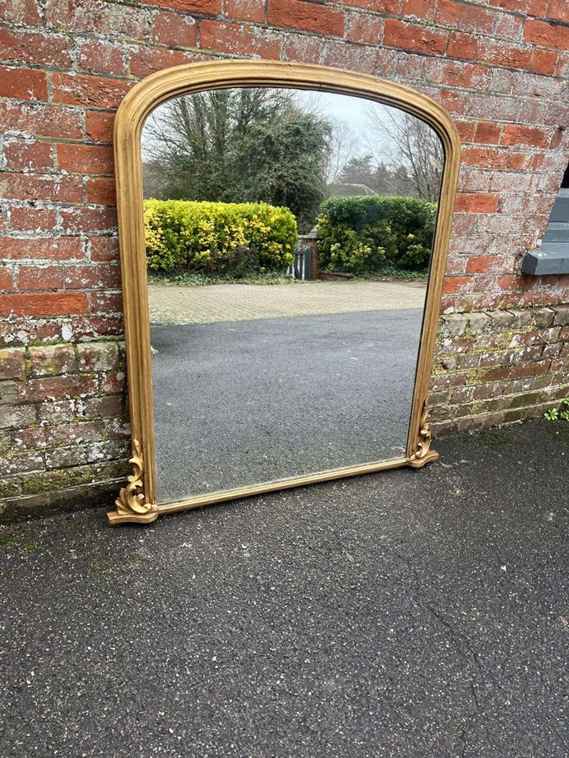 A Wonderful large Antique English 19th C arched top gilt Mirror.