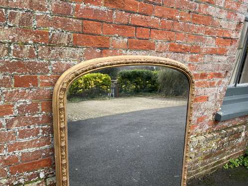 A Stunning large Antique English 19th C arched top ornate gilt Mirror.