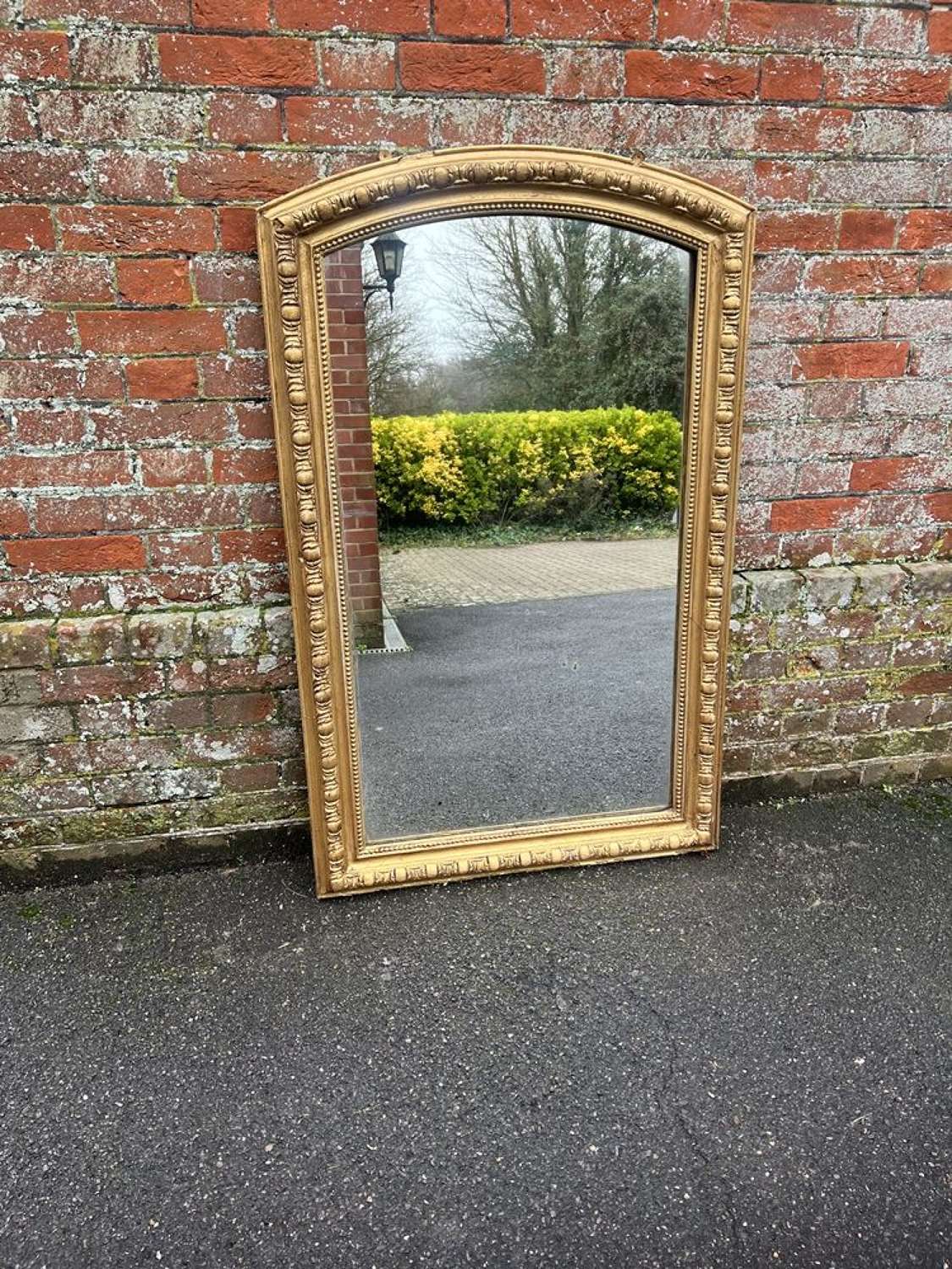 A Wonderful large Antique French 19th C shaped top gilt Mirror.