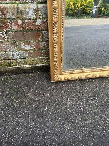A Wonderful large Antique French 19th C shaped top gilt Mirror.