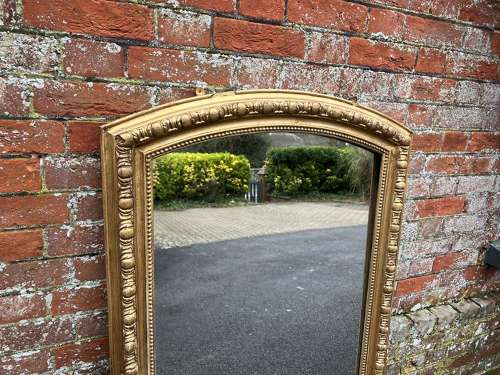 A Wonderful large Antique French 19th C shaped top gilt Mirror.