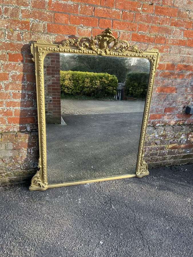 A Fabulous large Antique English 19th C gilt Overmantle Mirror.