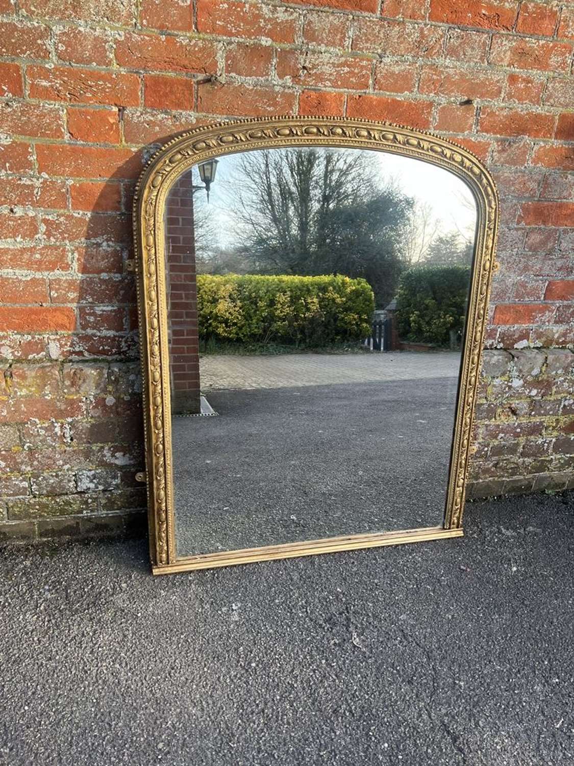 A Superb large Antique English 19thC arched top gilt Overmantle Mirror