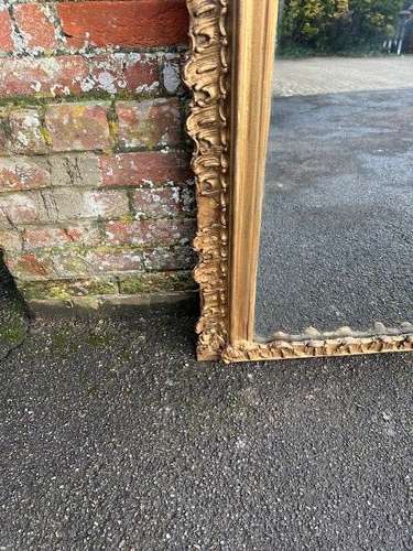 A Stunning large Antique English 19th C gilt shaped Overmantle Mirror.