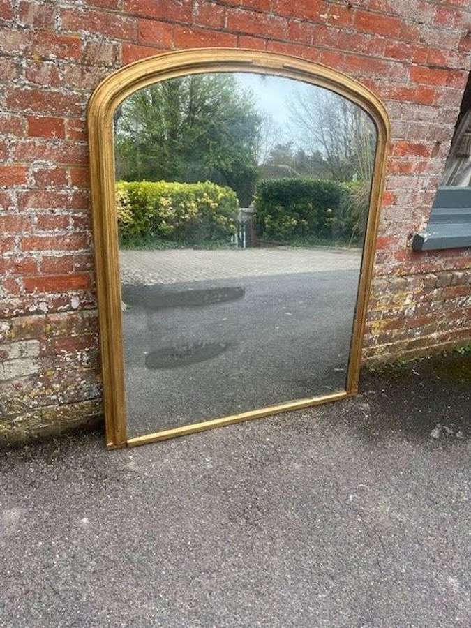 A Fab English 19th C arched top gilt Overmantle Mirror.