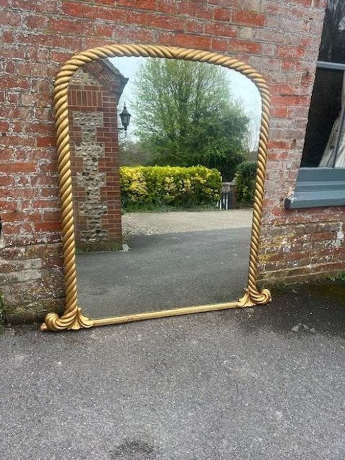 A Spectacular large Antique English 19th C arched gilt ribbed Mirror