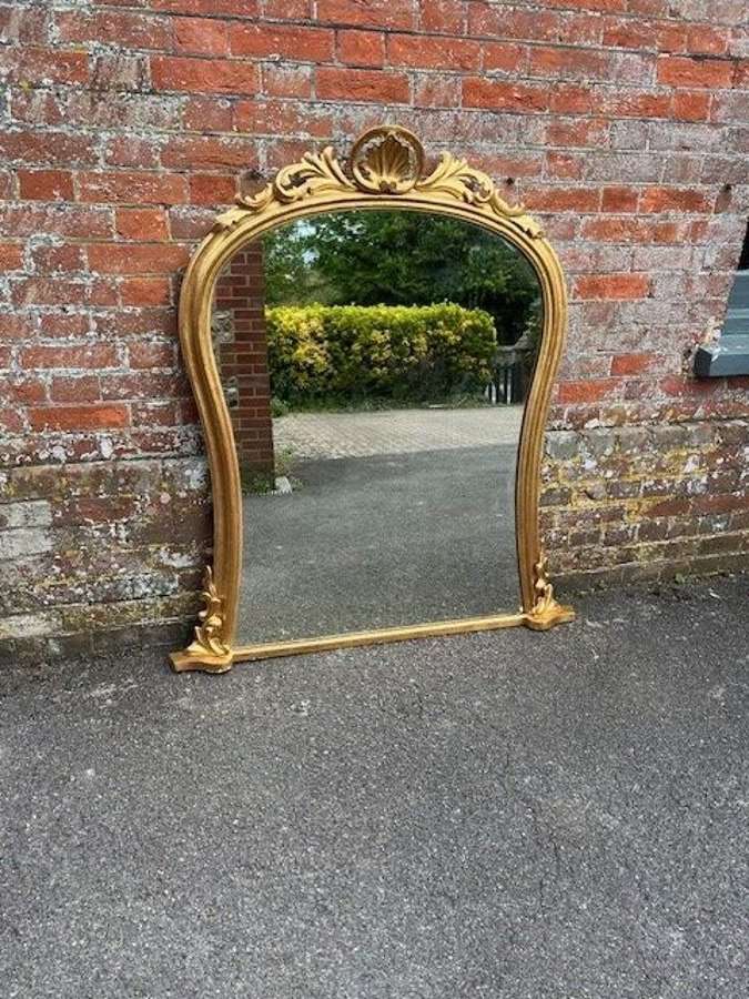 A Wonderful large Antique English 19th C shaped gilt Overmantle Mirror