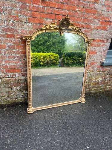 A Superb large Antique English 19th C shaped top original gilt Mirror.
