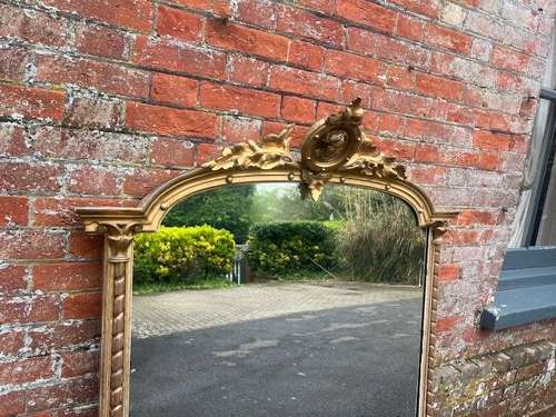 A Superb large Antique English 19th C shaped top original gilt Mirror.