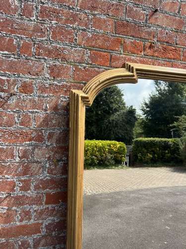 A Spectacular large Antique English 19th C shaped top gilt Mirror.